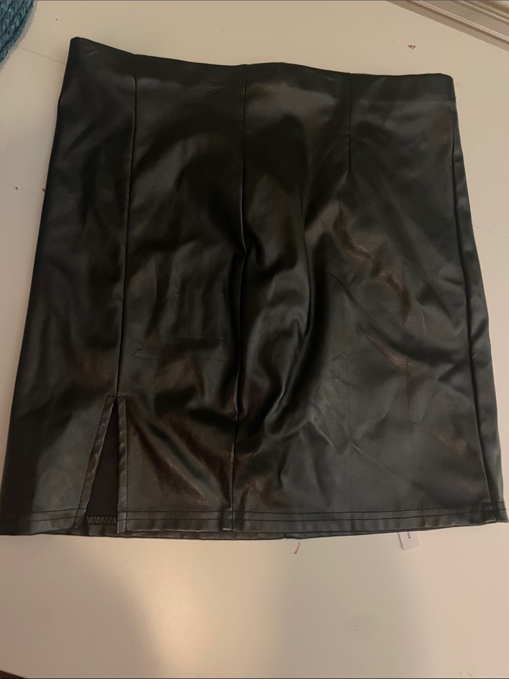 Sleek Black Faux Leather Mini Skirt with Front Slit